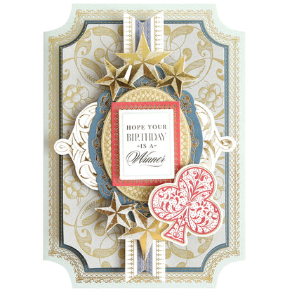 The Simply King of My Heart Card Making Kit features a decorative handmade card with gold stars, ornate patterns, a red club motif, and the message "Hope your birthday is a winner." Ideal for fans of 3D embellishments.
