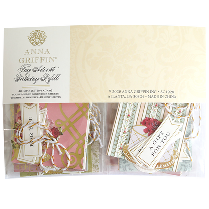 A package of Tag Advent Birthday Refill, featuring assorted cardstocks, scrapbook tags, and pink and cream embellishments—ideal for card making and DIY crafts.