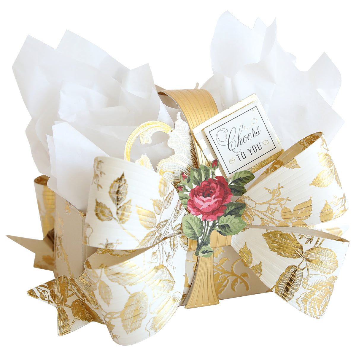A stylish white and gold bow made with Bow Box Dies features a floral accent and a "Cheers to You" tag, attached to white tissue paper—great for decorating gifts, treat boxes, or craft projects.