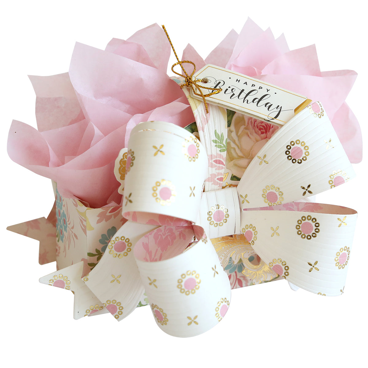 A birthday gift wrapped in pink tissue paper, topped with a large bow made using Bow Box Dies, and finished with a "Happy Birthday" tag—an ideal way to add creative flair to your floral-patterned treat box.