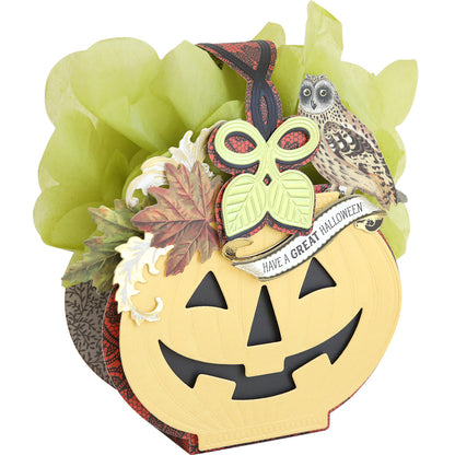 Create festive Halloween crafts with the Halloween Box Dies! Make a pumpkin box with a smiling jack-o-lantern face, green tissue paper, fall leaves, an owl, and a "HAVE A GREAT HALLOWEEN" banner—perfect for spooky displays.