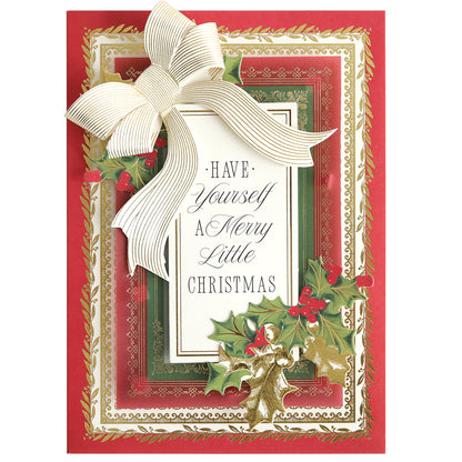 Get inspired for your next card with the Christmas Present Card Making Kit, featuring gold and red borders, holly decorations, a large striped white bow, and "Have Yourself A Merry Little Christmas" text—perfect for festive creations!.