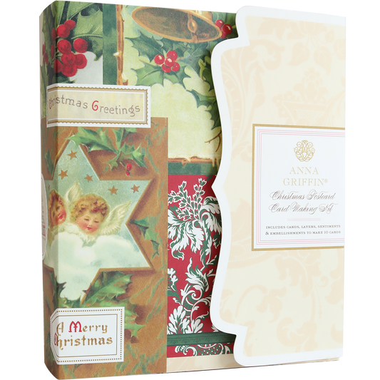 The Christmas Postcard Card Making Kit features vintage-style holiday designs inspired by classic postcards, with holly, angels, and traditional "A Merry Christmas" and "Christmas Greetings" sentiments.