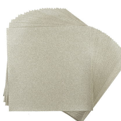 A stack of beige sanding sheets on a white background.