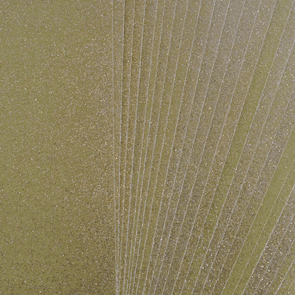 A close up of a green sheet of paper.