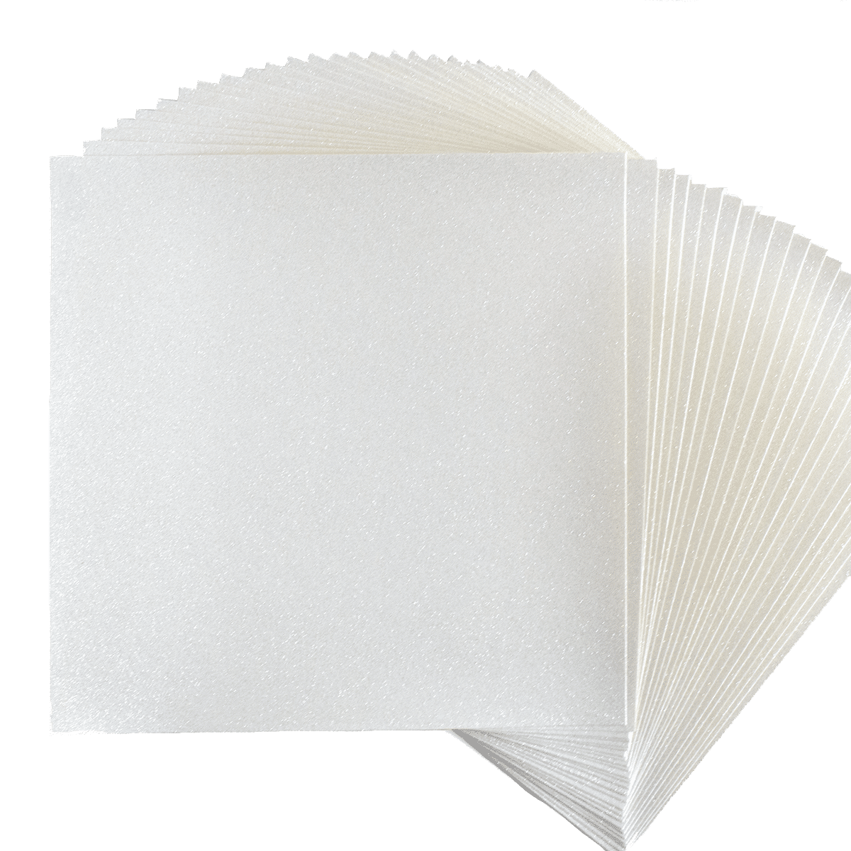 A stack of white paper squares on a white background.