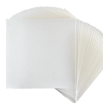 A stack of white paper squares on a white background.