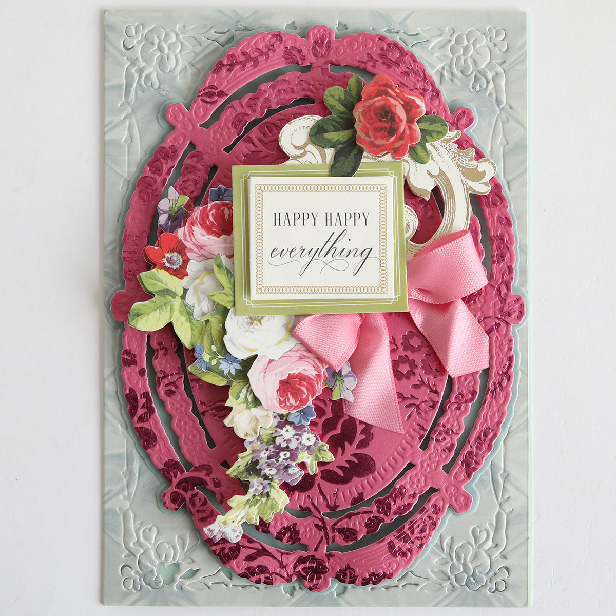 A card with flowers and ribbons, crafted using Color Drenched Cardstock Peony Pink for vibrant hues—perfect inspiration for your next card making project.