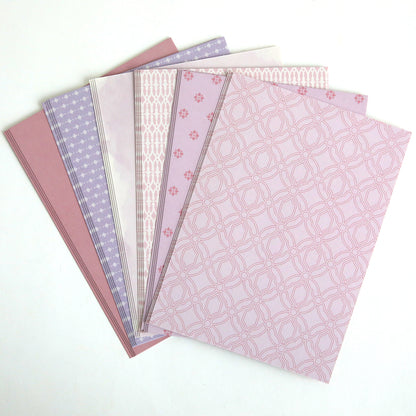 Color Drenched Cardstock Fresh Lilac sheets in pink and purple, fanned out on a white background—ideal for card making or pairing with hot foil plates for added shine.