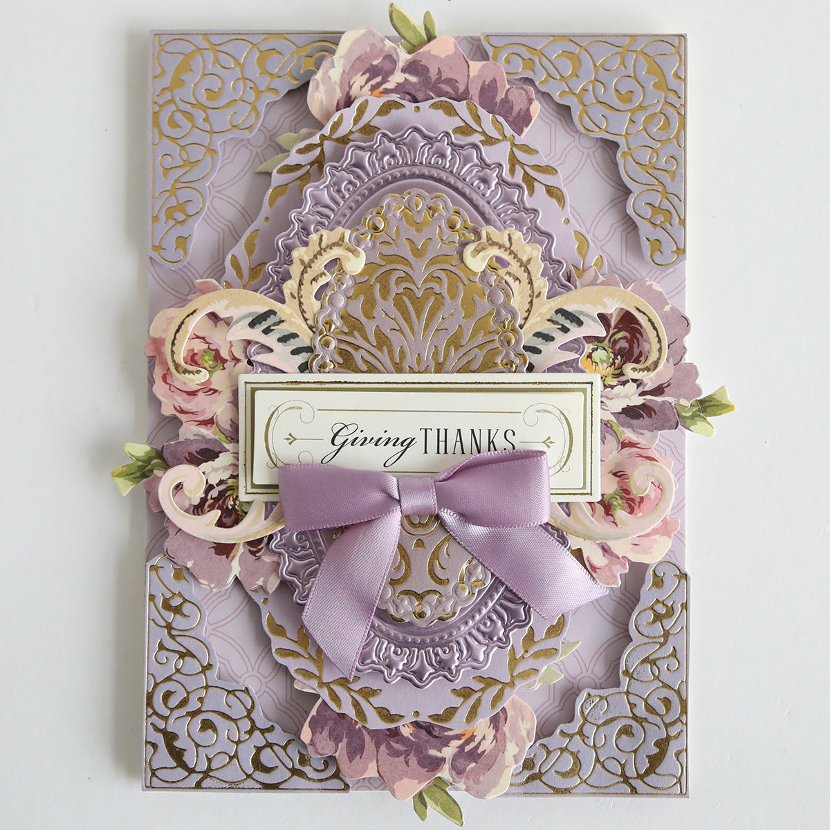 An ornate purple and gold greeting card with floral designs on Color Drenched Cardstock Fresh Lilac, featuring a lavender bow and "Giving Thanks" in the center—perfect for card making inspiration.