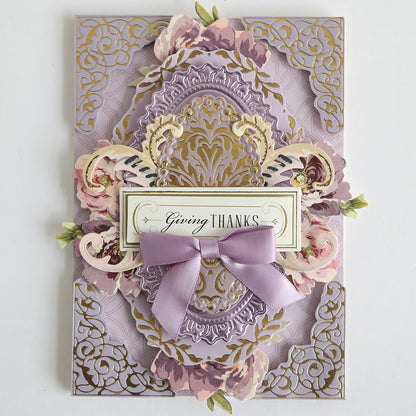An ornate purple and gold greeting card with floral designs on Color Drenched Cardstock Fresh Lilac, featuring a lavender bow and "Giving Thanks" in the center—perfect for card making inspiration.