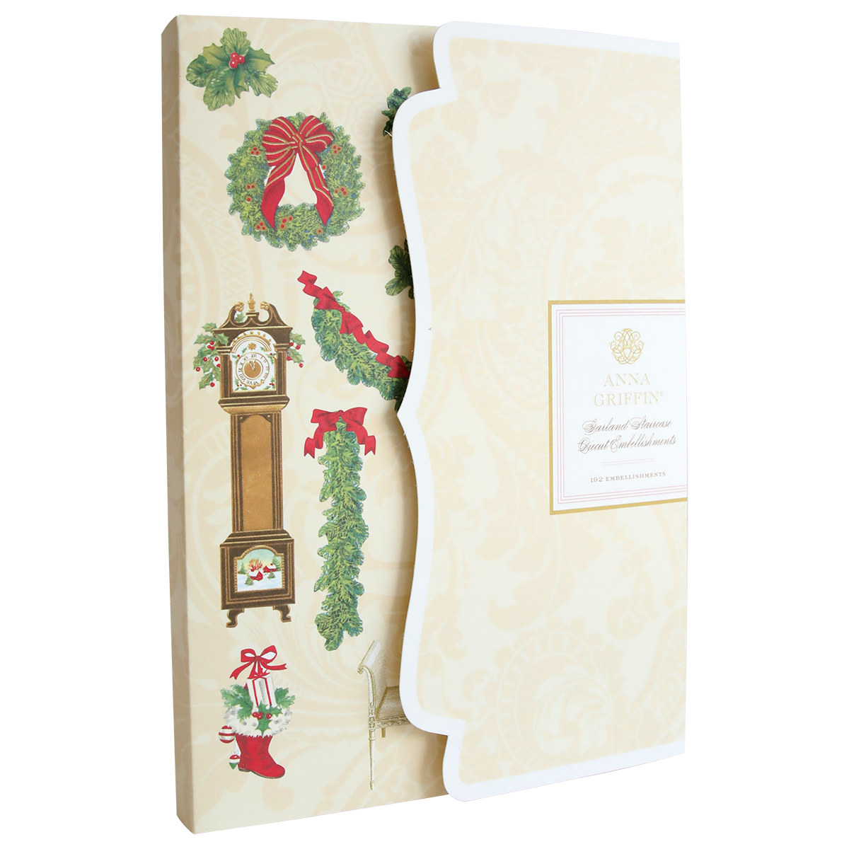 A decorative folder is partially open, revealing Garland Staircase Die Cut Stickers and other Christmas-themed scrapbook embellishments such as a wreath, grandfather clock, stocking, holly, and a bow.