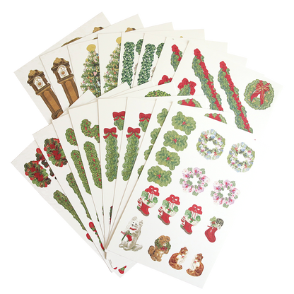 Ten sheets of Grand Staircase Dies and Embellishments Christmas-themed stickers—showcasing wreaths, garland accents, stockings, grandfather clocks, dogs, and other festive decorations—are arranged in a fanned-out display on a white background, perfect for pairing with your favorite 3-dimensional cutting dies.