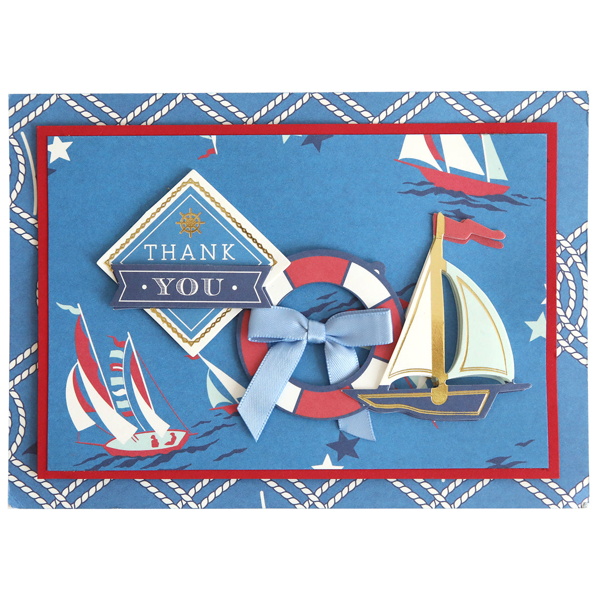 Nautical thank you card on Lighthouse 12x12 Cardstock, featuring sailboats, a life preserver with blue bow, "Thank You" sign, and coastal designs on a blue background with ropes and stars.