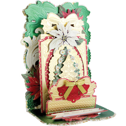 An ornate, movable 3D Christmas card made with layered gold, red, and green designs featuring a white poinsettia, tree, and gold bows—created using the 3D Christmas Interactive Pulley Dies (13 dies included).