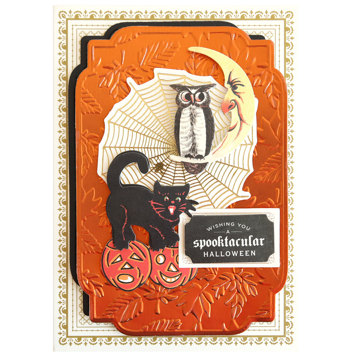 Create a Halloween card with Spellbound Patterns Cut & Emboss Folders—orange leaves, black cat on jack-o'-lanterns, owl with spider web under a crescent moon, and "Wishing you spooktacular Halloween." Ideal for seasonal crafting projects.
