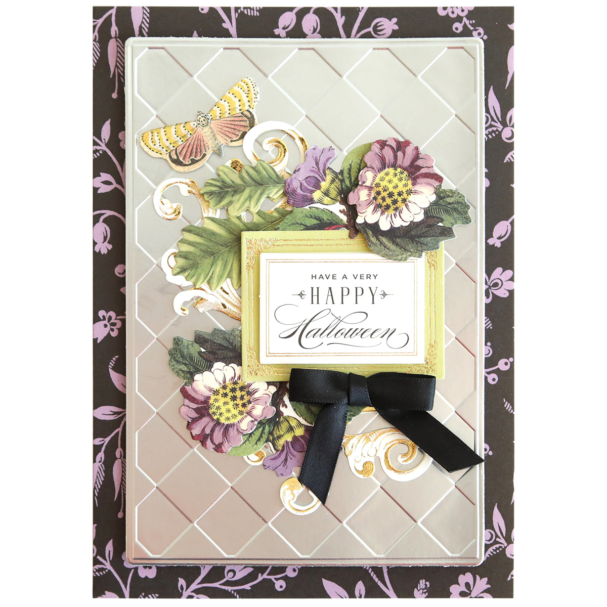 Create beautiful Halloween cards with Spellbound Patterns Cut & Emboss Folders—featuring floral designs, a butterfly, and a black bow with "Have a Very Happy Halloween" sentiment—ideal for seasonal crafting.