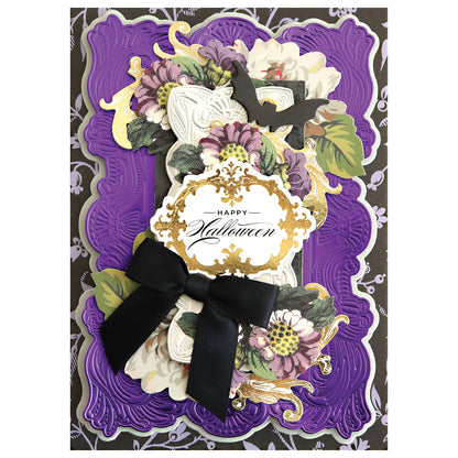 Halloween card crafted with Gothic Revival 3D Frames—features purple and black layers, gold accents, floral motifs, a black ribbon, and “Happy Halloween” sentiment for an ornate dimensional look.