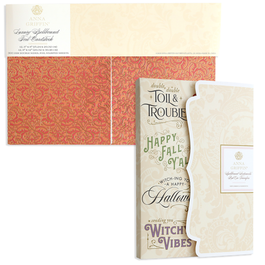 Two sets of decorative cardstock—Spellbound Halloween Crafting Pair—in orange damask and cream floral, perfect for pairing with sentiment Rub On Transfers.