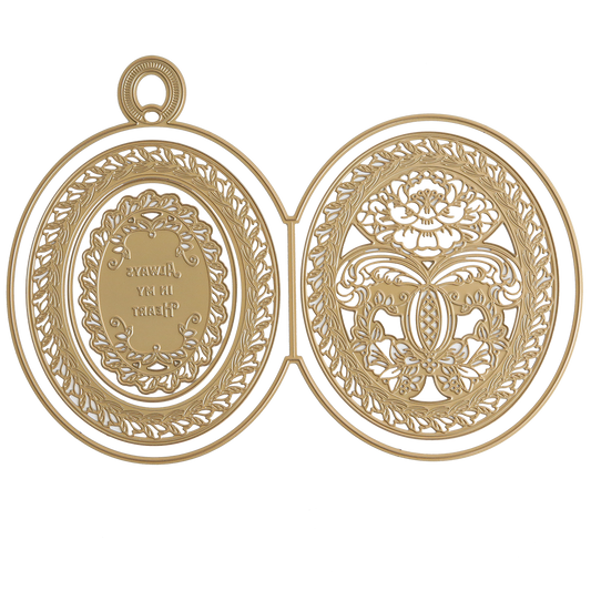 The Locket Card Dies feature an open gold locket design with ornate engraving on the left and a filigree floral motif on the right—ideal inspiration for keepsake cards or elegant locket-style designs.