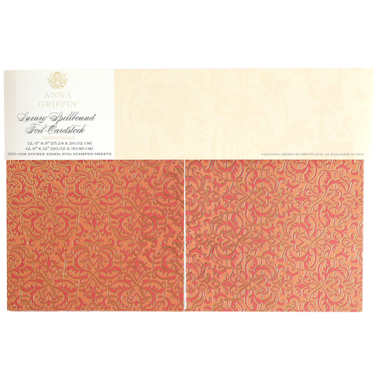 The Luxury Spellbound Foil Cardstock features 30 double-sided orange and gold ornate foil sheets, 12" x 12", adding a luxurious touch to your crafting projects.