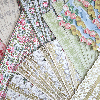 The Virginia 12" Border Stickers feature floral and ornate gold designs, ideal for layering on scrapbook pages or pairing with die cut borders.