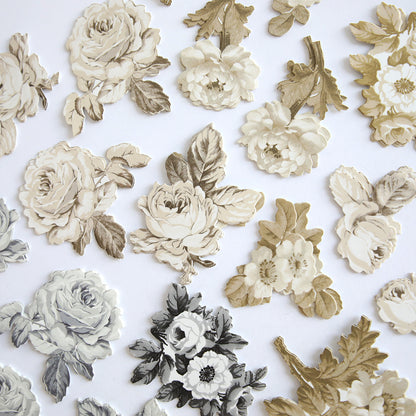 Faded Rose Die Cut Embellishments feature vintage-style floral stickers in cream, beige, gray, and black—perfect for crafts and beautifully arranged on a white background.