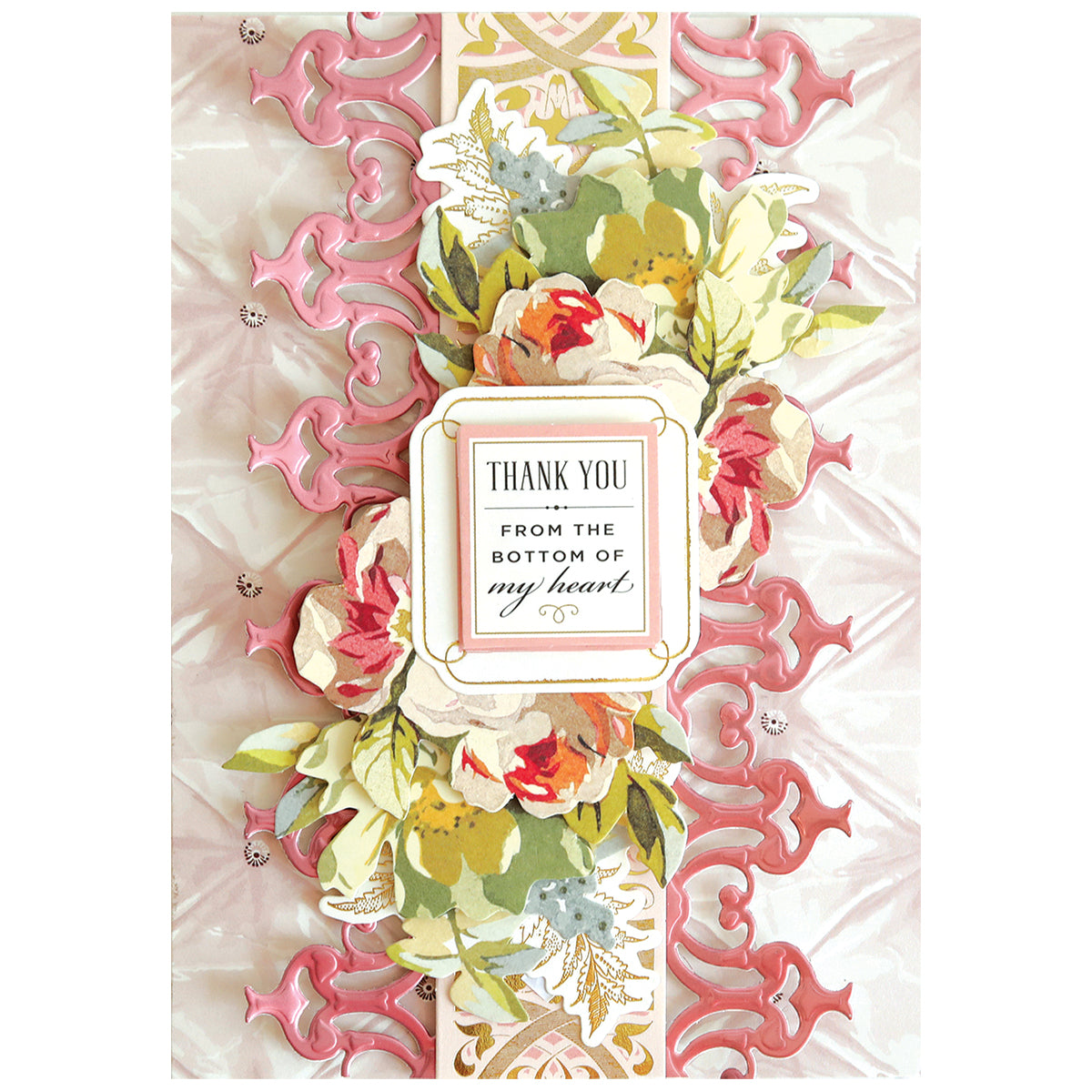Create elegant borders for cards or scrapbook pages with the 12" Grand Trimmings Border Dies, featuring pink and gold ornamental patterns, floral accents, and a central "Thank you from the bottom of my heart" label.