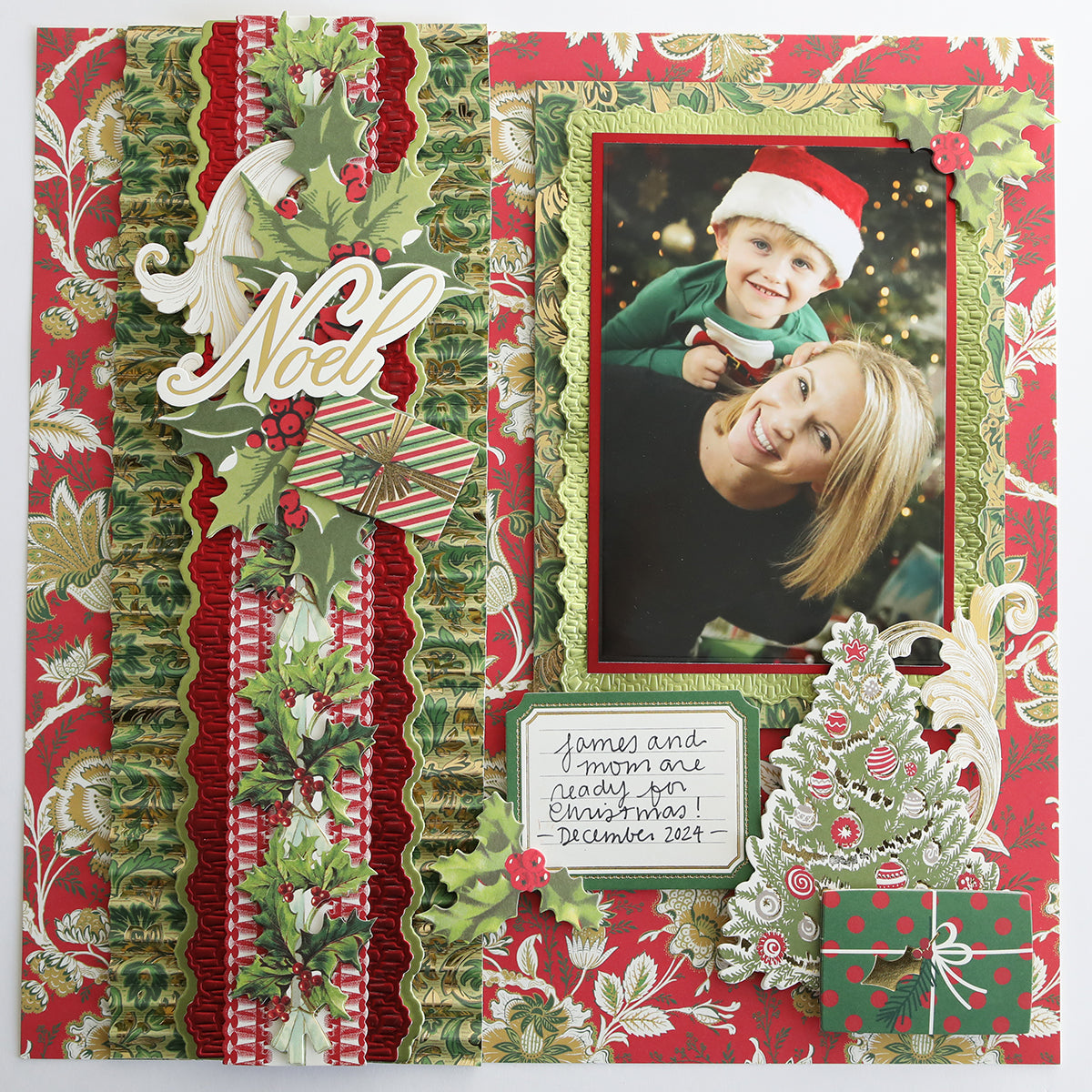 A festive Christmas scrapbook page on Jasmine Holiday Cardstock Collection, showcasing a smiling woman and child in holiday outfits with embellishments and a "James and Mom are ready for Christmas, December 2021" note.