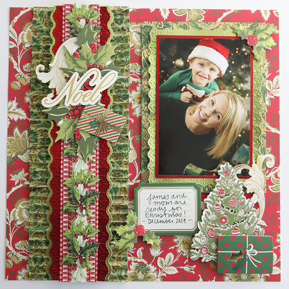 A festive Christmas scrapbook page on Jasmine Holiday Cardstock Collection, showcasing a smiling woman and child in holiday outfits with embellishments and a "James and Mom are ready for Christmas, December 2021" note.