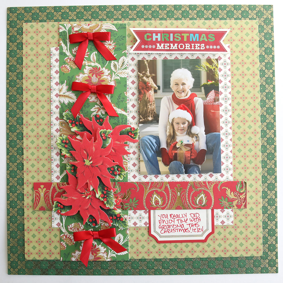 A Christmas scrapbook page displays a photo of an elderly woman and young girl, festive decor crafted from the Jasmine Holiday Cardstock Collection, and a note that reads, "You really can't even plan this grand of a Christmas!.