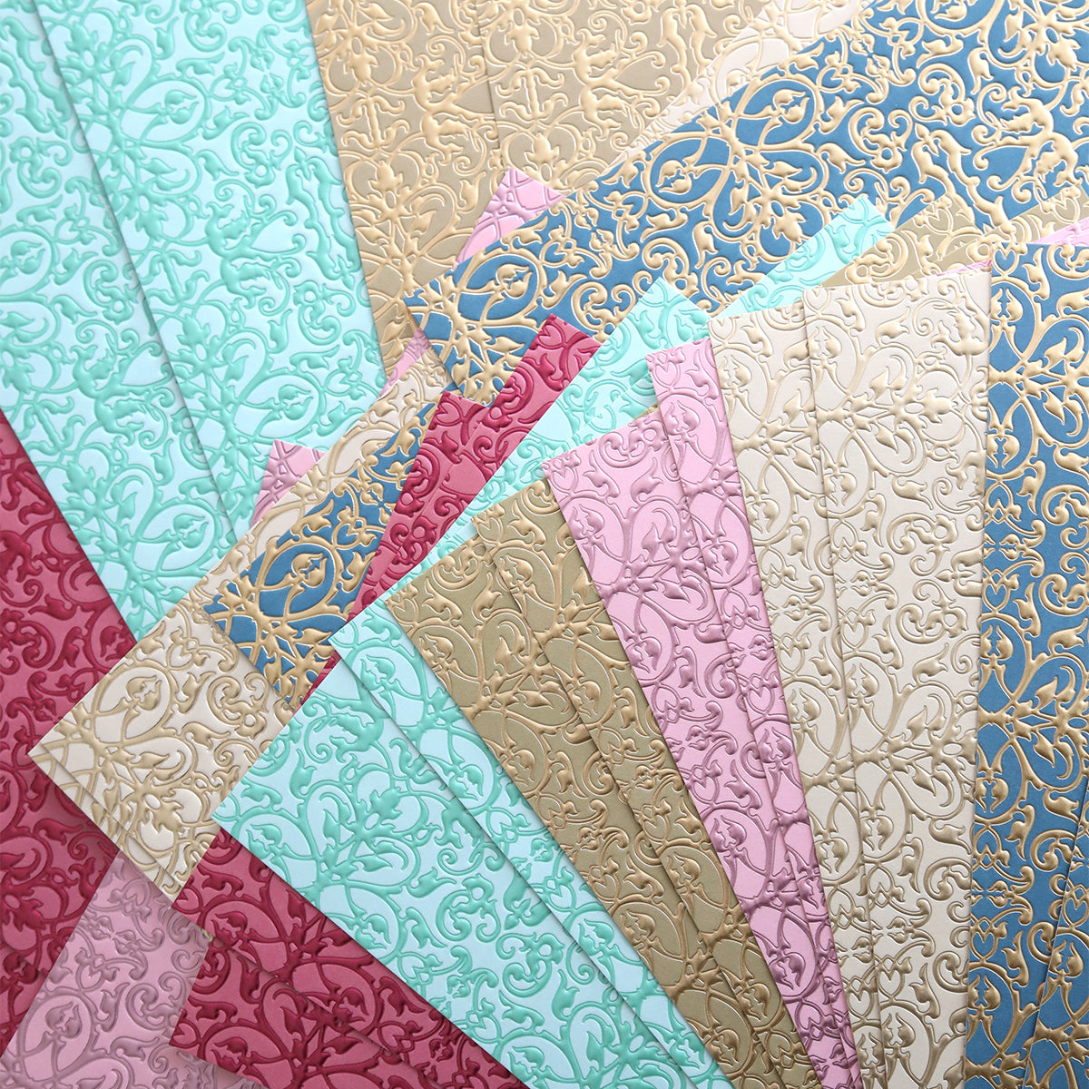 Jasmine Luxury Tonal Foil Cardstock offers assorted sheets in pink, gold, blue, and green with intricate swirling patterns—perfect foil embossed cardstock for your crafting projects.