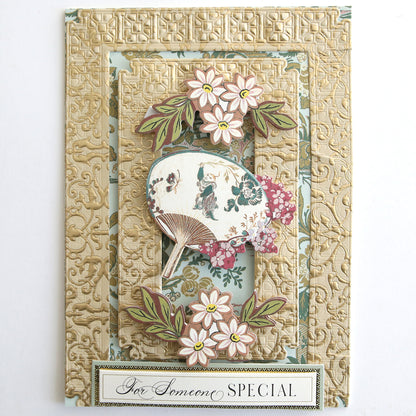 A decorative card made from Jasmine Luxury Tonal Foil Cardstock features embossed gold patterns, floral designs, an ornate fan, and the phrase “For Someone SPECIAL” at the bottom.
