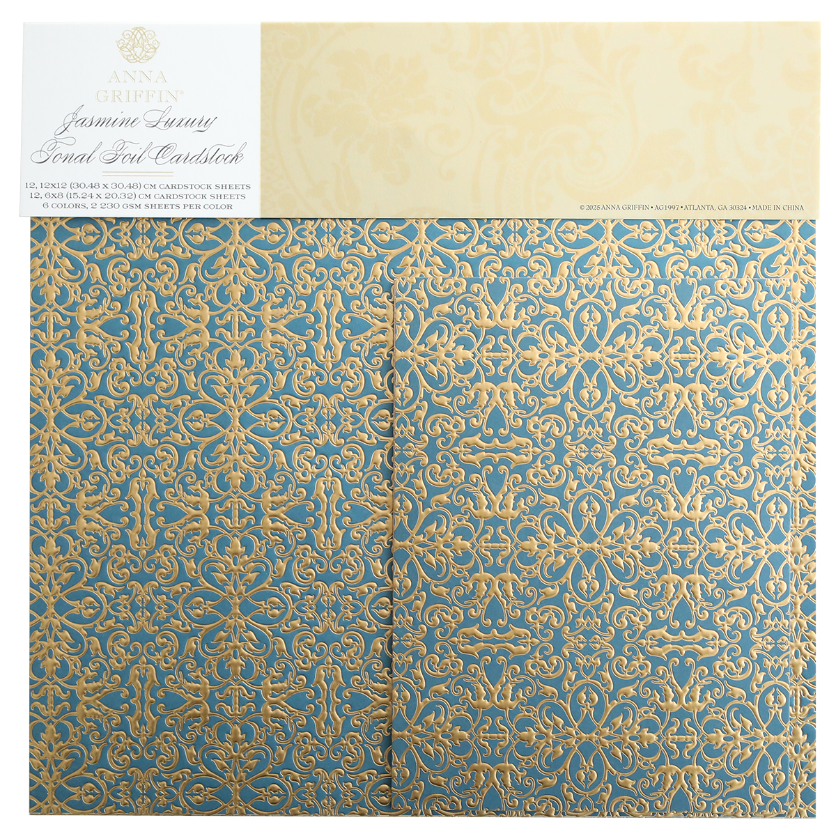 The Jasmine Luxury Tonal Foil Cardstock has ornate blue and gold scrolls on foil-embossed paper, ideal for crafting. The "Anna Griffin Jasmine Luxury" label at the top adds a premium touch.