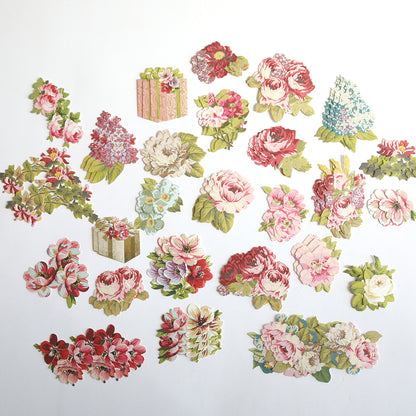 The Jasmine Papercrafting Collection features colorful floral embellishments and gift-shaped paper cutouts arranged with die-cut borders on a white background.