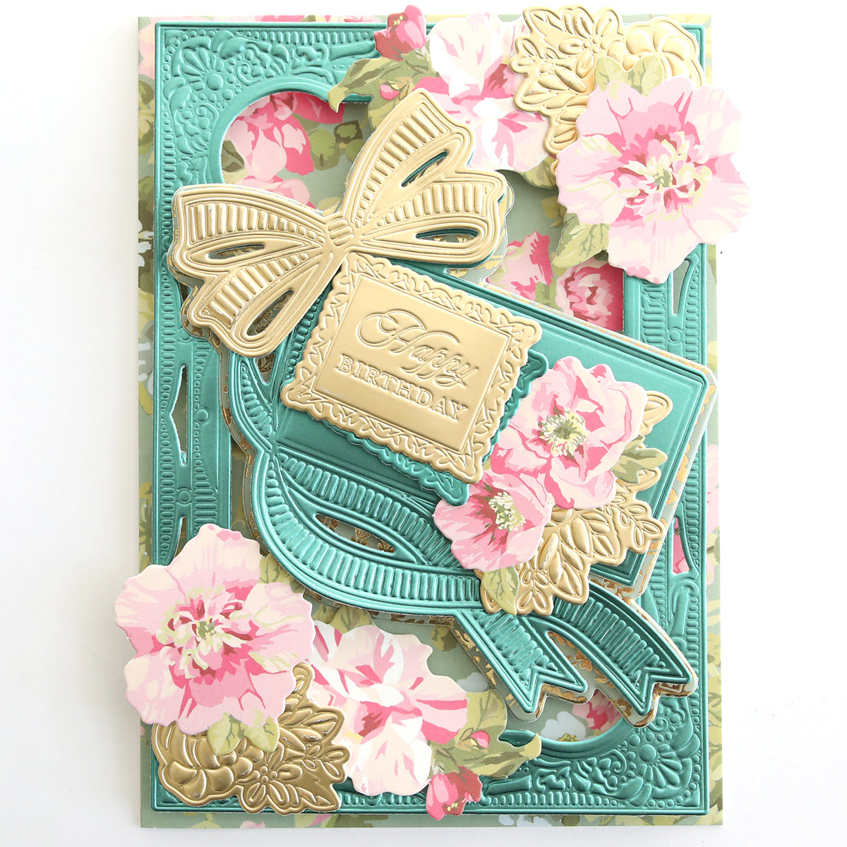 The "Create Everyday Embellishments" birthday card features gold and teal embossing, a large bow, pink floral accents, and layered blooms for an elegant, decorative design.