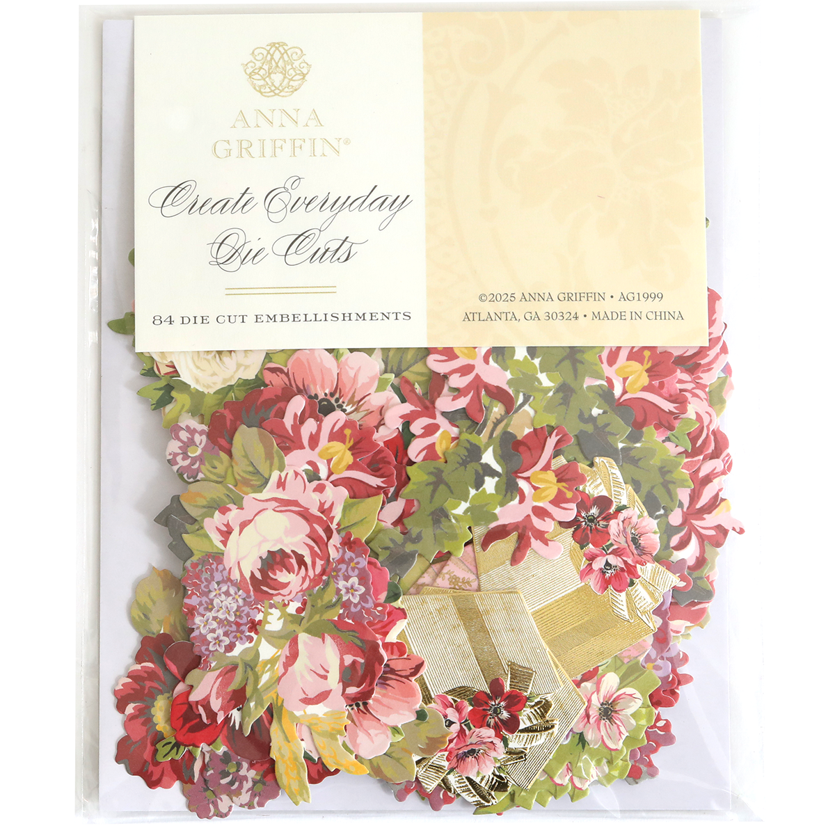 A package of Create Everyday Embellishments is shown in clear packaging, containing 84 layered floral blooms and embellishments for creative projects.