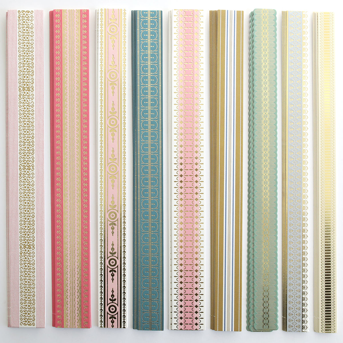 Ten vertical strips from the Jasmine Cardstock, Borders & Embellishments set in assorted colors and gold foil patterns, each with unique intricate designs and varying widths.
