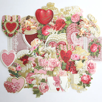 Vintage Valentine Die Cut Embellishments—an assortment of cards and decorations with hearts, roses, cherubs, and Victorian designs—perfect for crafts or decor, arranged on a white background.