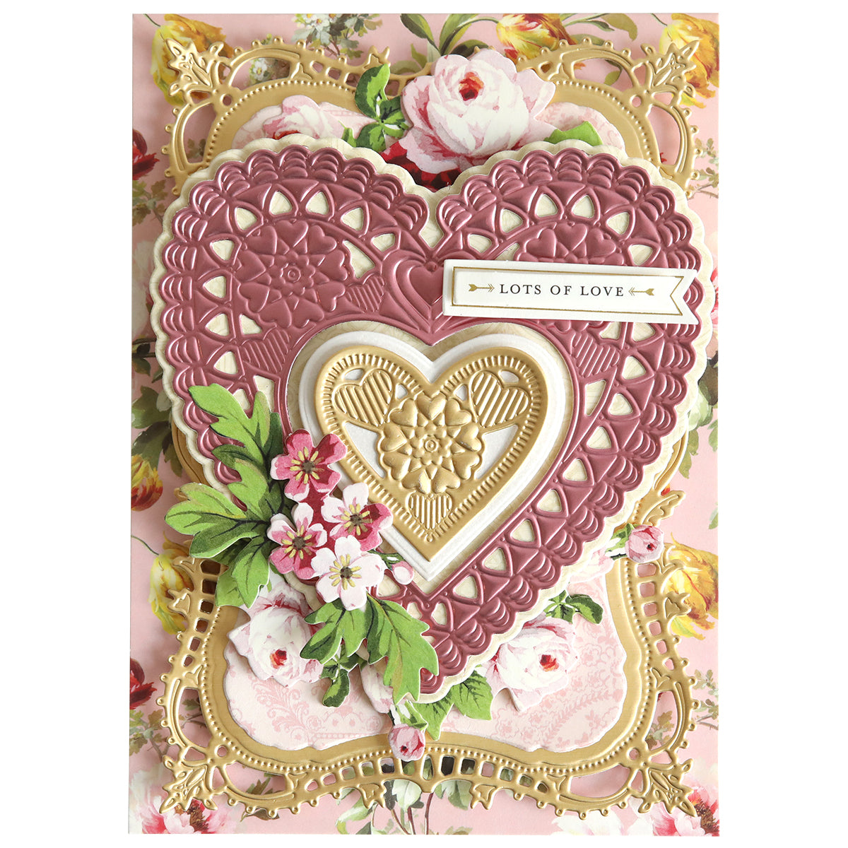 Perfect for handmade cards or Valentine’s Day crafts, 3D Concentric Heart Dies let you create layered pink and gold heart shapes with floral patterns and a "Lots of Love" banner on a flowered background.