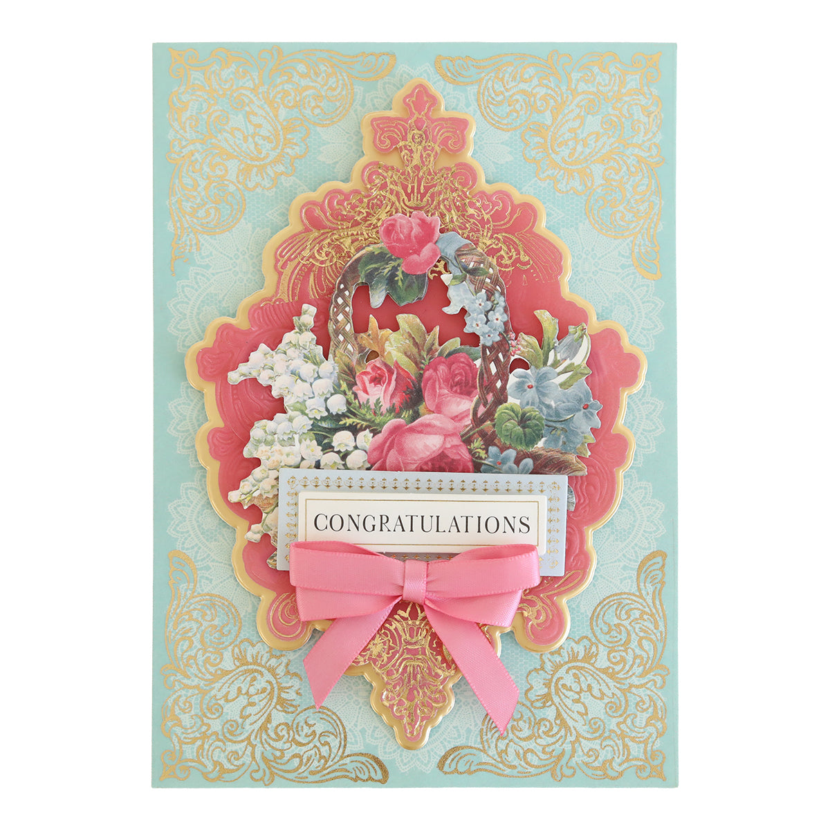 Perfect Double Bows 50 count congratulations card featuring a floral basket illustration, a pink double loop bow, and ornate gold scrollwork on a light blue background.