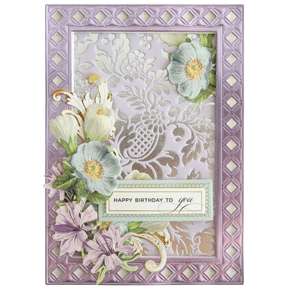A decorative birthday card made with Gilded Floral Hot Foil Plates, featuring a lavender lattice border, embossed floral background, layered flowers, and "Happy Birthday to you" in the center.