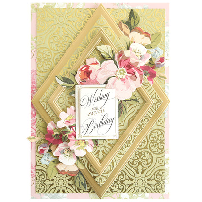 Birthday card made with Gilded Damask Hot Foil Plates, embossing machine, layered paper, and pink and white floral accents. Gold embossed patterns. Front text: "Wishing you a magical Birthday.