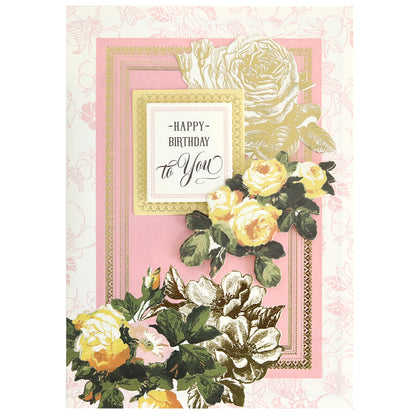 A pink birthday card with yellow and white flowers, gold accents, and 3D details from the Folded Rose Card Making Kit, featuring "Happy Birthday to You" in the center.
