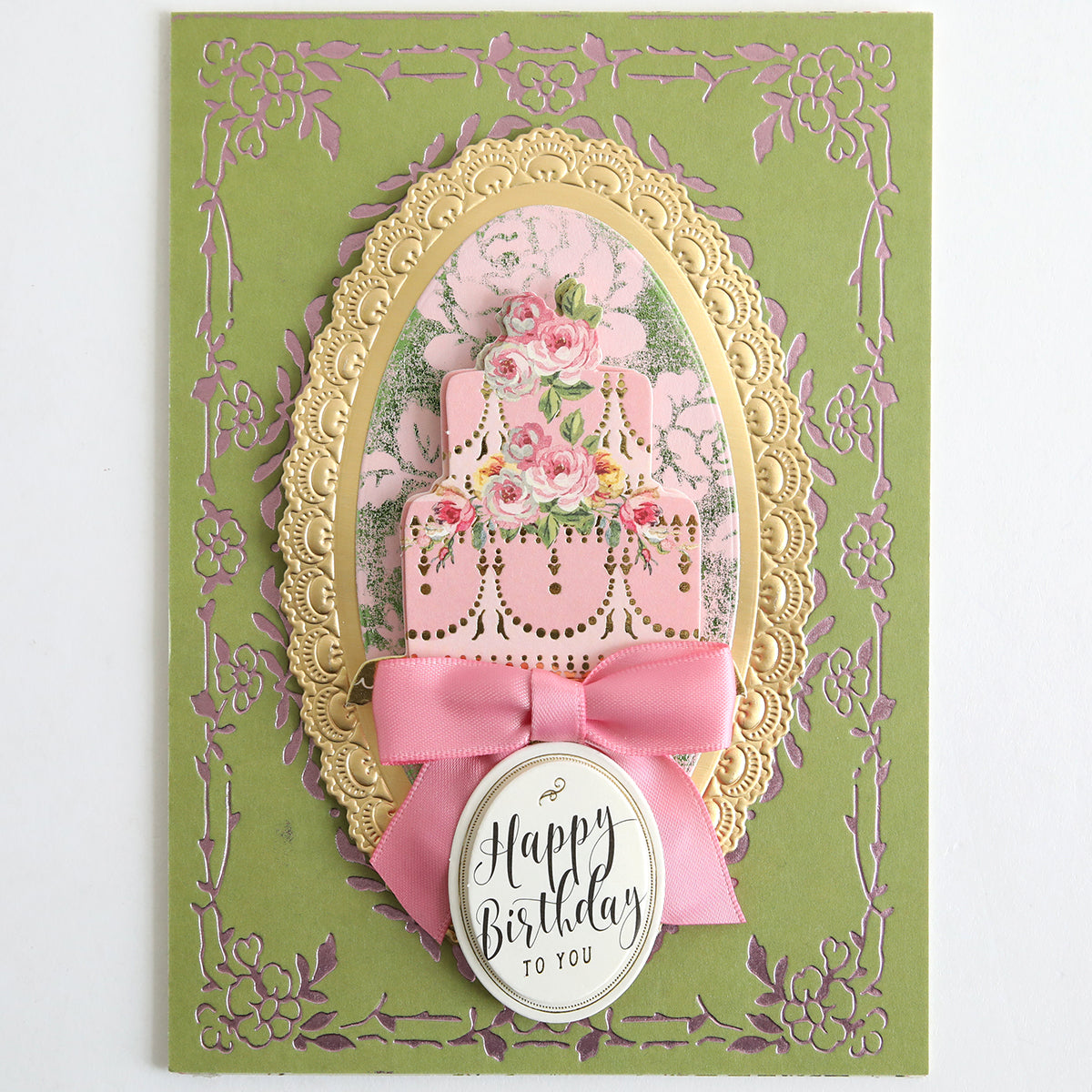 The Perfect Palette Pastel Gild Hot Foil card features ornate gold and pink floral designs, a pink ribbon, a decorated birthday cake, and "Happy Birthday To You" on the front—ideal for sophisticated paper crafts.