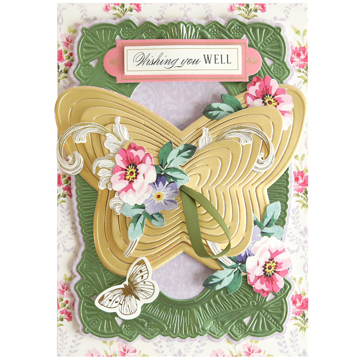 Butterfly Garden Kirigami and Embellishments greeting card featuring a central die-cut gold butterfly, floral accents, and a “Wishing you WELL” plaque on a green decorative frame and floral background.