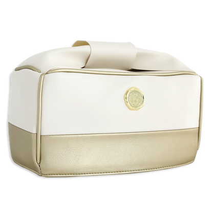 A rectangular two-tone handbag with a white top, gold bottom, and a gold circular emblem—perfect as an Empress Mini Elite Dust Cover or a stylish die cutting machine cover.