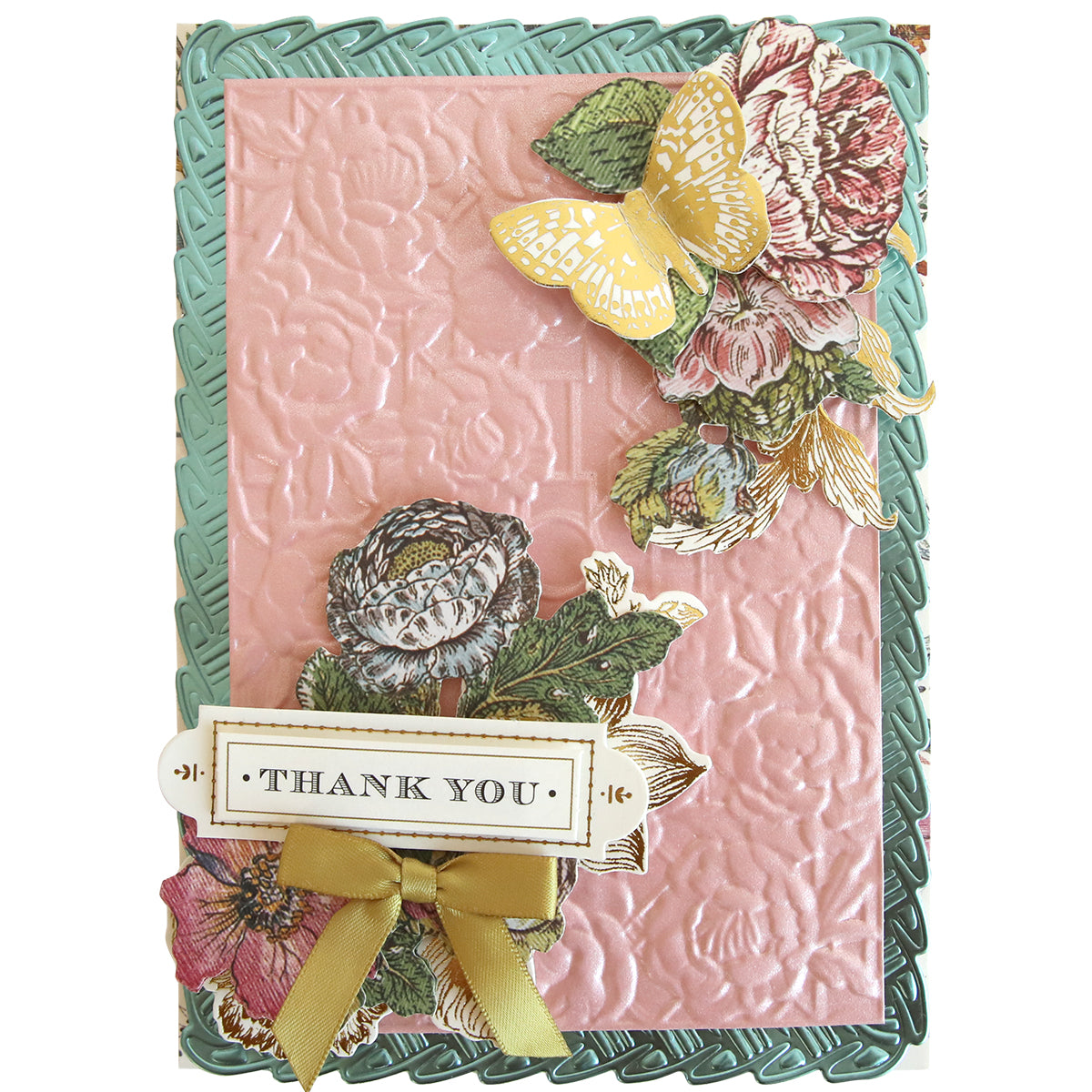 Handmade greeting card featuring Garden Gate and Pavilion 3D Embossing Folders for a pink floral background, layered with die-cut flowers, a yellow butterfly, a gold ribbon, and a “THANK YOU” tag.