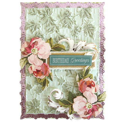 Handmade birthday card featuring a light green textured leaf background created with Garden Gate and Pavilion 3D Embossing Folders, an ornate pink border, floral embellishments, and a central greeting tag.