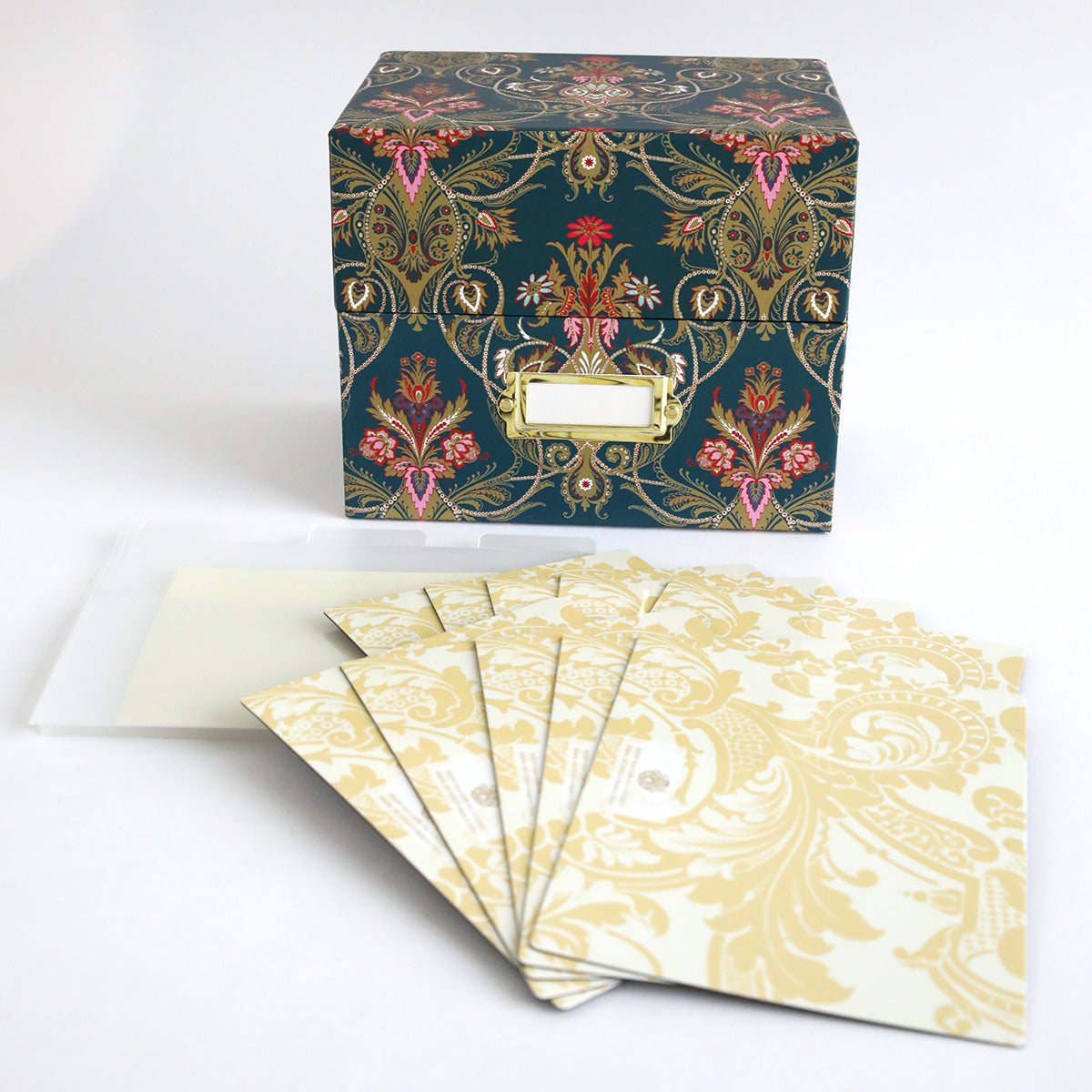The Jasmine Large Die Storage Box Set of 2 features gold label holders and is perfect for organizing oversized dies or storing magnetic sheets. Shown with ornate gold and white cards and translucent envelopes for stylish organization.